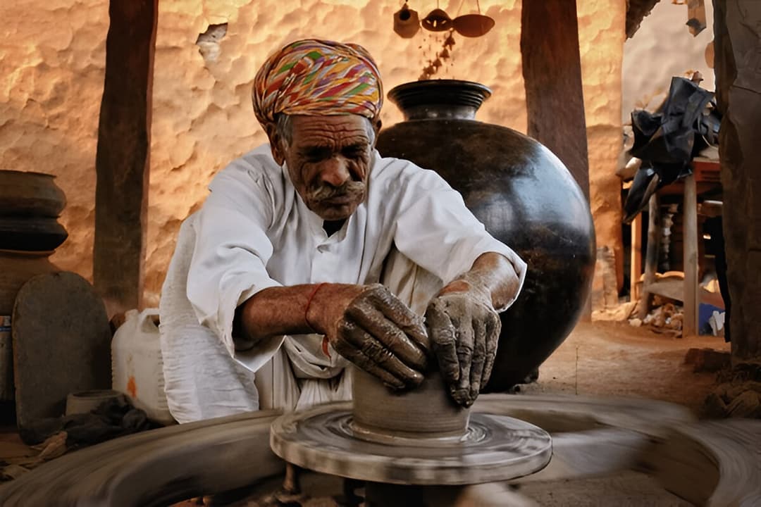Traditional artisan crafting pottery
